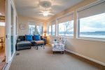 Sunroom/Living room with windows overlooking Keuka Lake
